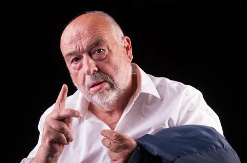 Orld man reasoning and gesticulating Stock Photos