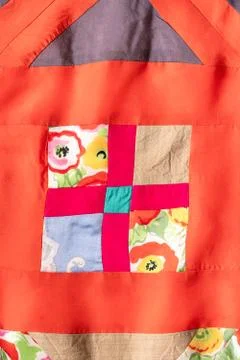 Ornament of hand-sewn patchwork cloth Stock Photos