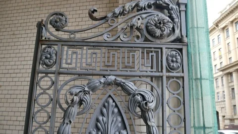 Ornament made in the forge. Hanging at the gate. Stock Footage 119917890
