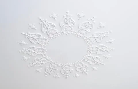 Ornament on the white ceiling of the apartment Stock Photos