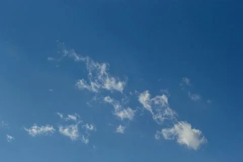 Ornamental clouds. Dramatic sky. Epic storm cloudscape Soft sunlight. Panoram 스톡 사진