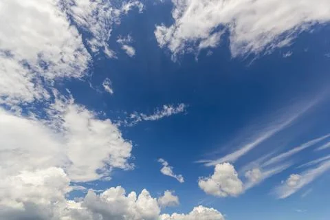 Ornamental clouds. Dramatic sky. Epic storm cloudscape Soft sunlight. Panoram 写真素材