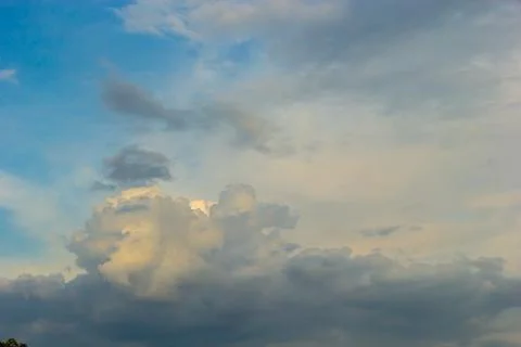 Ornamental clouds. Dramatic sky. Epic storm cloudscape Soft sunlight. Panoram 写真素材