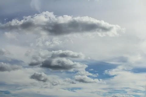 Ornamental clouds. Dramatic sky. Epic storm cloudscape Soft sunlight. Panoram 写真素材