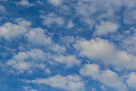 Ornamental clouds. Dramatic sky. Epic storm cloudscape Soft sunlight. Panoram 写真素材