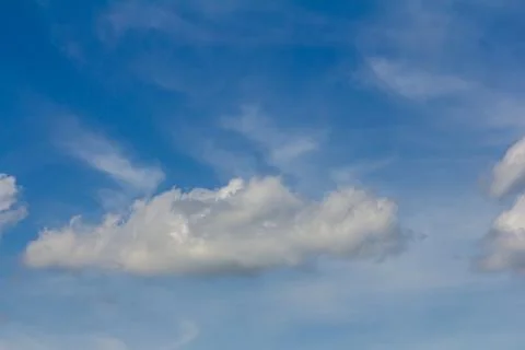 Ornamental clouds. Dramatic sky. Epic storm cloudscape Soft sunlight. Panoram 写真素材