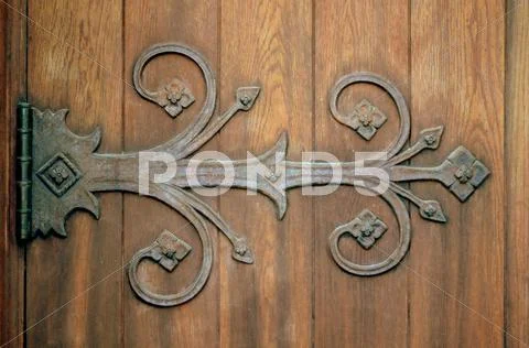 Ornamental iron hinge Stock Photos