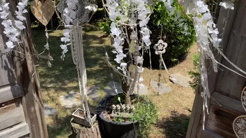 Ornaments attached to the door with different ropes Stock Footage 246351135