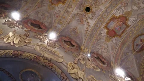Ornate Baroque Ceiling Paintings and Stucco Decoration in Historic Church Stock-Footage 345207063