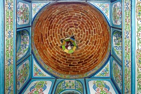 Ornate Ceiling with Concentric Brick Dome and Painted Floral Panels Stock Photos