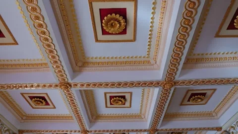 Ornate ceiling with gold leaf and decorative patterns in a historic building Stock Footage 292001652