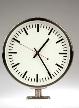 Ornate clock on a gray background Stock Photos