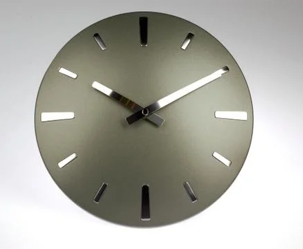 Ornate clock on a gray background 스톡 사진