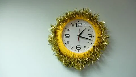 Ornate clock in yellow frame Stock Photos