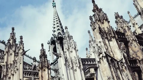 Ornate Cologne Cathedral Facade Beneath Cloudy Sky Stock Footage 345719511
