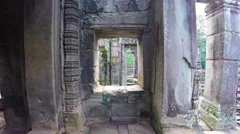 Ornate Columns and stone Windows of Bayon Temple in Cambodia Stock Footage 64930768