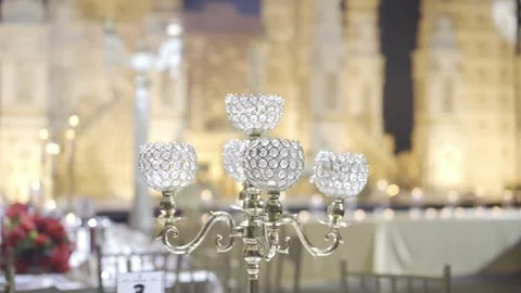 An ornate crystal candelabra placed on a table Stockbeeldmateriaal 305293063