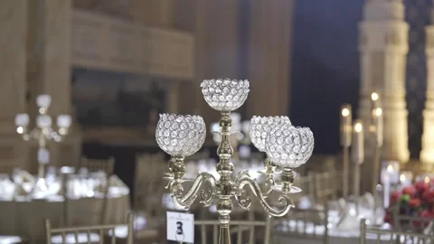 An ornate crystal candelabra placed on a table Stock-Footage 305293064