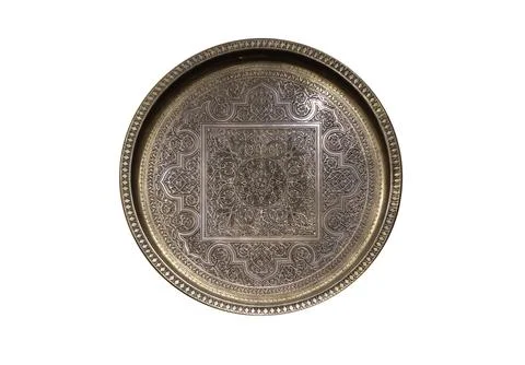 Ornate engraved empty round brass tray isolated on white Stock Photos