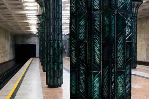 Ornate green ceramic columns inside Gafur Gulom metro station in Tashkent. .. Stock Photos
