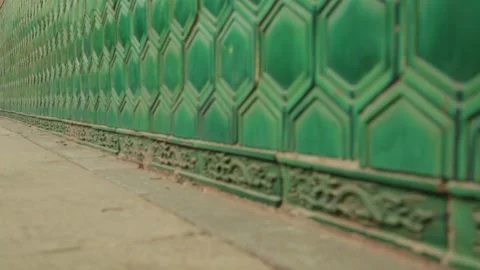 Ornate Green Glazed Wall with Dragon Reliefs at Lama Temple, Beijing, China Stock Footage 345829696