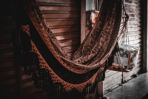 Ornate hammock in a rustic setting Stock Photos