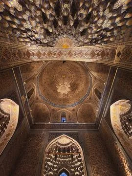 Ornate interior dome of Gur-e-Amir mausoleum in Samarkand featuring intrica.. Stock Photos