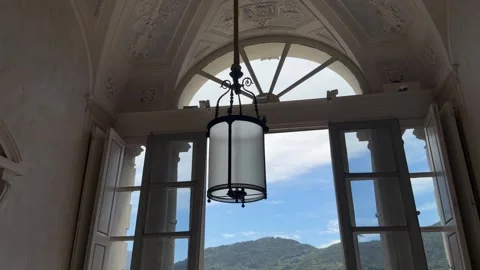 Ornate Lantern and Arched Windows Inside Historic Italian Villa Lake Como Stock Footage 337325951