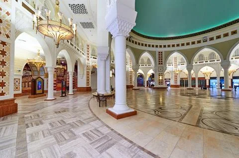 Ornate Middle Eastern interior with arches and chandeliers in Dubai Stock Photos
