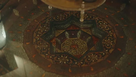 Ornate Moroccan brass lantern base with geometric Islamic pattern Stock Footage 334515101