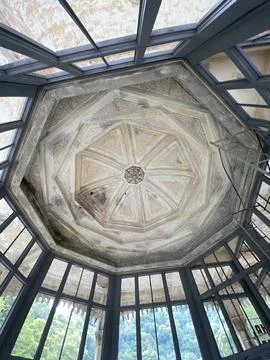 Ornate octagonal ceiling in historic building with geometric patterns and l.. Stock Photos