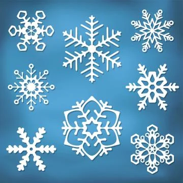Ornate snowflake silhouettes Stock Illustration