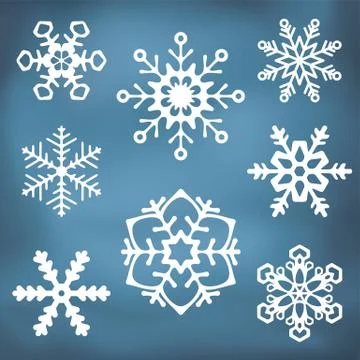 Ornate snowflake silhouettes Stock Illustration