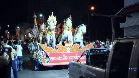 Ornate Thai parade float with white ceremonial horses and pageant queens beside Stock Footage 336220273