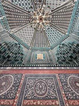 Ornate tiled interior ceiling of a mausoleum at Shah-i-Zinda necropolis in .. Stock Photos