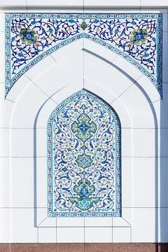 Ornate tilework with floral arabesque patterns on the facade of Minor Mosqu.. Stock Photos