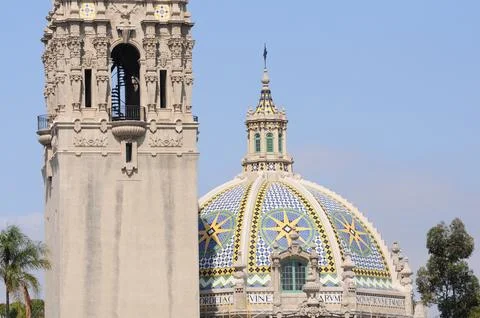 Ornate tower and dome under clear blue sky in Balboa Park, San Diego Stock Photos
