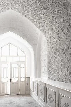 Ornate white plaster interior of Muhammad Amin Khan Madrasa in Ichan Kala, .. Fotos de archivo