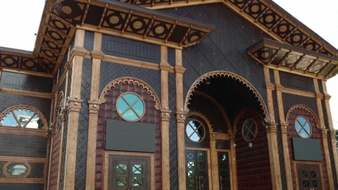 Ornate wooden facade with carved patterns and arches Stock Footage 331199864