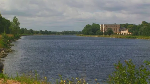 Orne River with Chateau in background located in Benouville Normandy, France Stock Footage 102350371