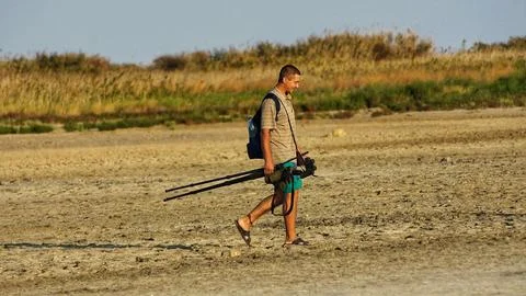 Ornithologist on the Move Stock Photos