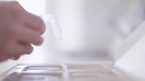 Orthodontist Checking Vacuum Form Retainer Stock Footage 76081812