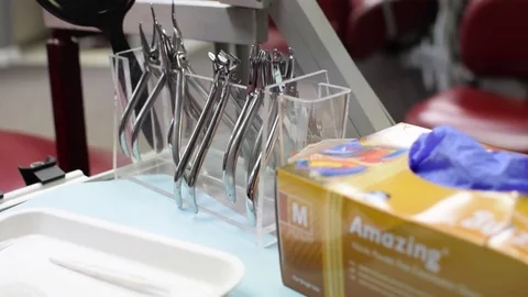 Orthodontist Tools Sitting on a Table, Invisalign on a Table, Tracking Shot, Stock Footage 79625359