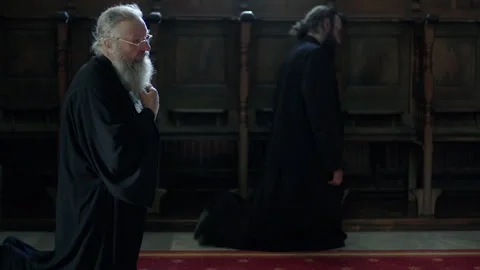 Orthodox christian monk praying inside a Mount Athos monastery Stock Footage 330188682
