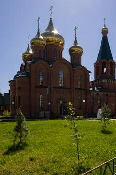 Orthodox Church, patch of sunlight is reflected on the domes of the church Stock Photos