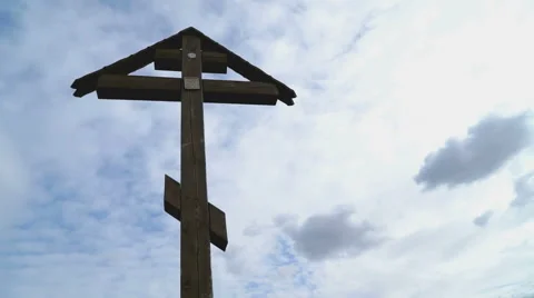 Orthodox cross on a background of floating clouds Stockbeeldmateriaal 61973321