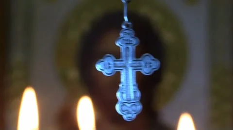 Orthodox cross on a background of the icon Stock Footage 57294726