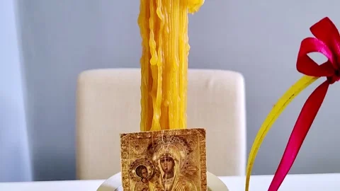 Orthodox Easter, candle, bread, eggs and icon on the table Stock Footage 286222802