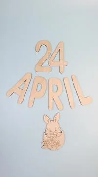 Orthodox Easter date - April 24, decorative wooden elements. Vertical. Stock Photos