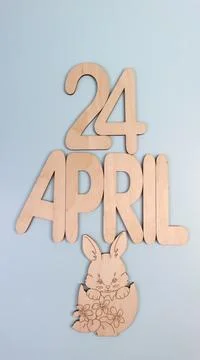 Orthodox Easter date - April 24, decorative wooden elements. Vertical. Stock Photos